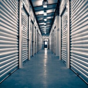 Storage facility interior shot of the hallway with units on either side